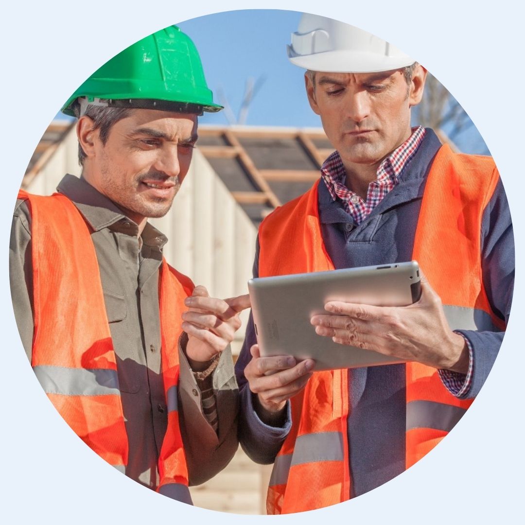 Construction workers discussing a project